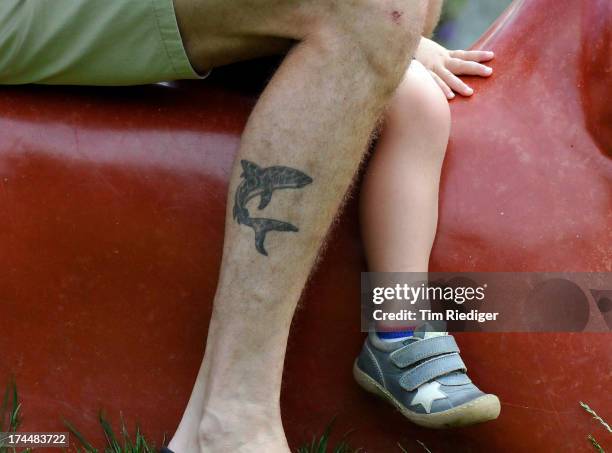 Tattoo on the leg of Crown Prince Frederik of Denmark, who attends the annual Summer photocall for the Royal Danish family at Grasten Castle on July...