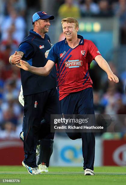 Adam Riley of Kent celebrates taking the wicket of Gary Wilson of Surrey during the Friends Life T20 match between Surrey Lions and Kent Spitfires at...