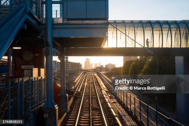 train station in east london at sunset, uk - tramway stock pictures, royalty-free photos & images
