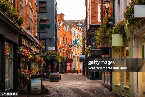 carnaby street, london, uk - high end store fronts stock-fotos und bilder