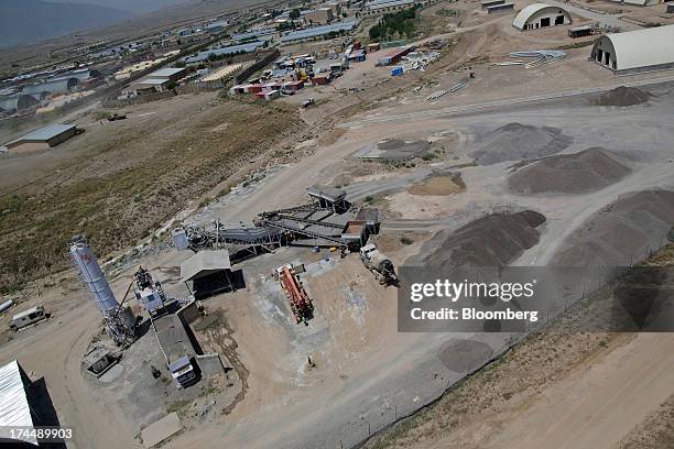 Concrete plant churns out supplies for construction at Camp Parsa, an Afghan Army base in Khost province, Afghanistan, on Saturday, June 22, 2013....