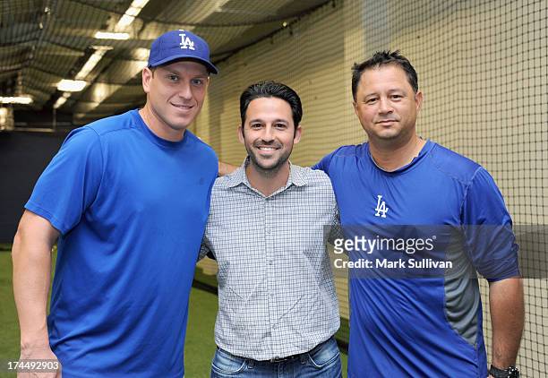 Los Angeles Dodger catcher A.J. Ellis, Franklin Sports director e-commerce Adam Franklin and Los Angeles Dodgers assistant hitting coach John...