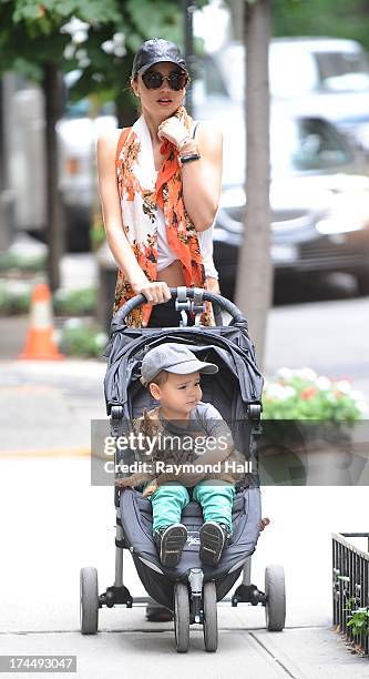 Model Miranda Kerr and Flynn Bloom are seen in Soho on July 26, 2013 in New York City.