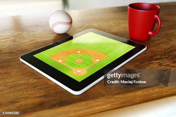 baseball field on tablet placed on table - baseball ball stock illustrations
