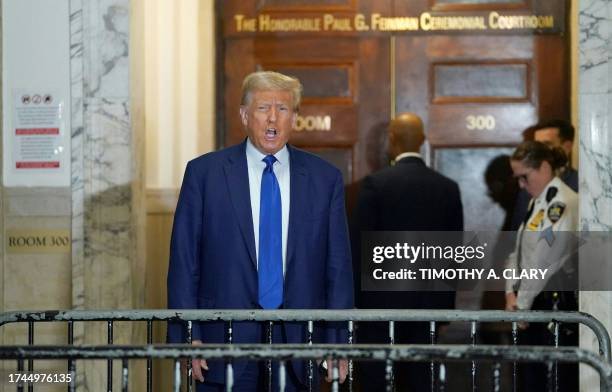 Former US President Donald Trump arrives for his civil fraud trial at New York State Supreme Court on October 25, 2023 in New York City. Donald...