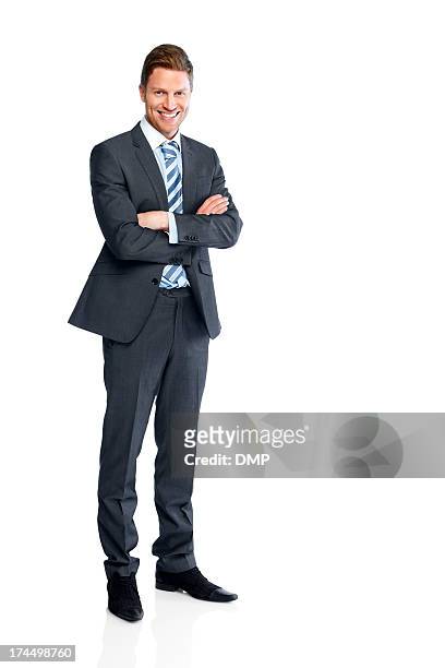 businessman standing with his arms folded on white - posen stockfoto's en -beelden