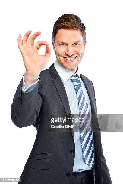business executive gesturing an excellent job - ok hand sign stock pictures, royalty-free photos & images