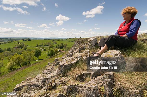 auvergne landscape with woman - auvergne stock-fotos und bilder