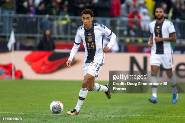 Jamal Musiala of Germany dribbles the ball during an international friendly game between Germany and USMNT at Pratt and Whitney Stadium on October...