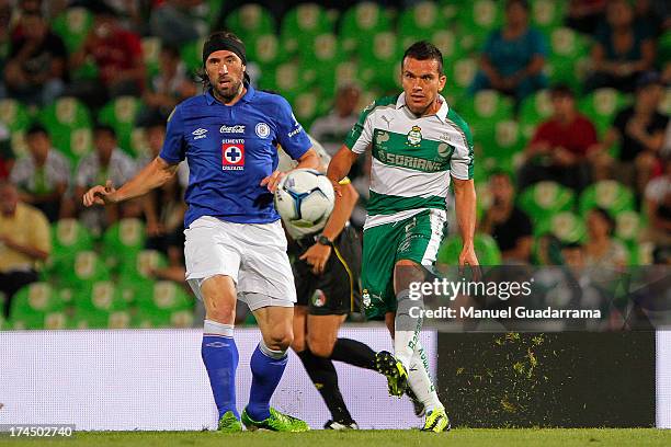 Juan Pablo Rodriguez of Santos drives the ball during a match between Santos and Cruz Azul as part of the Apertura 2013 Liga MX at Modelo stadium, on...