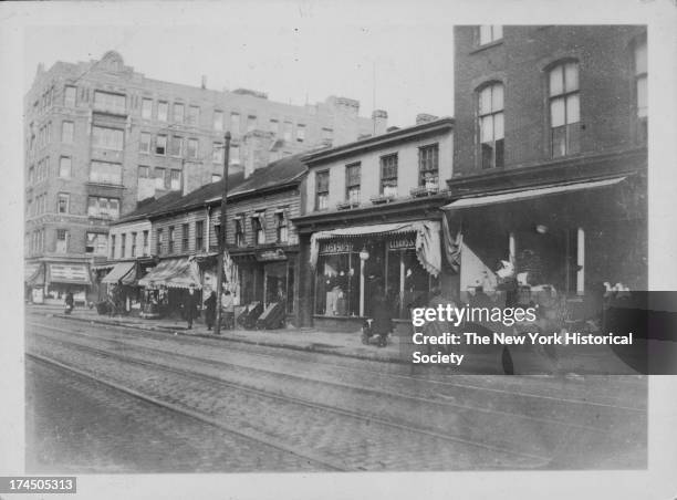 Northeast corner of Grand Street and Rodney Street, numbers 401 to 411, The first house on the corner was Mahler's Bakery c.1870; the fourth house...