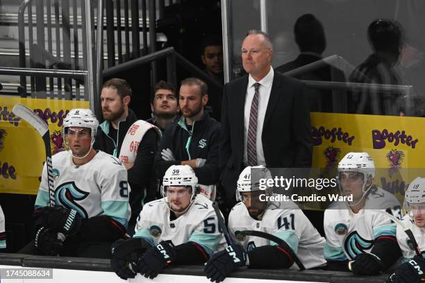 Assistant coach Dave Lowry of the Vegas Golden Knights looks up ice against the Seattle Kraken in the first period at T-Mobile Arena on October 10,...