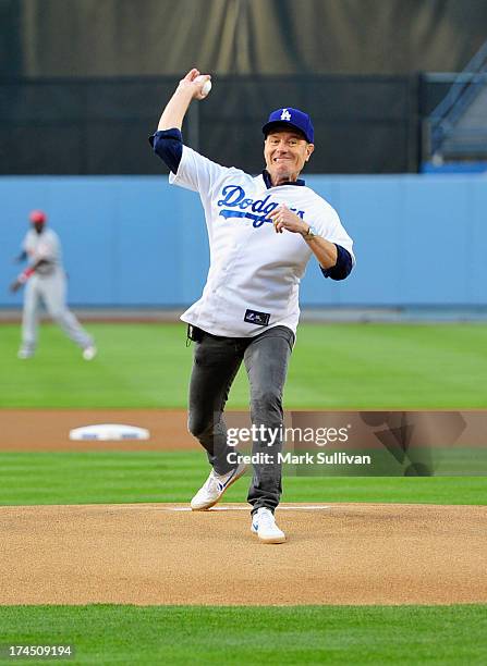 Actor Bryan Cranston throws out the ceremonial first pitch before the MLB game between the Cincinnatti Reds and Los Angeles Dodgers at Dodger Stadium...