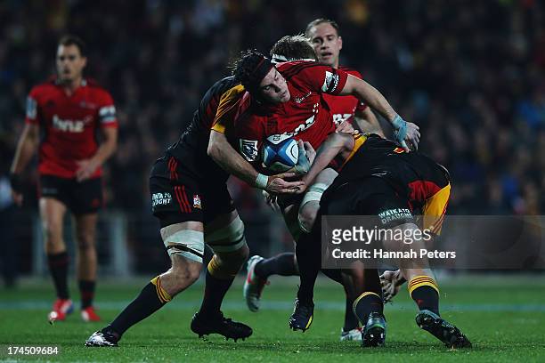 Matt Todd of the Crusaders charges forward during the Super Rugby semi final match between the Chiefs and the Crusaders at Waikato Stadium on July...