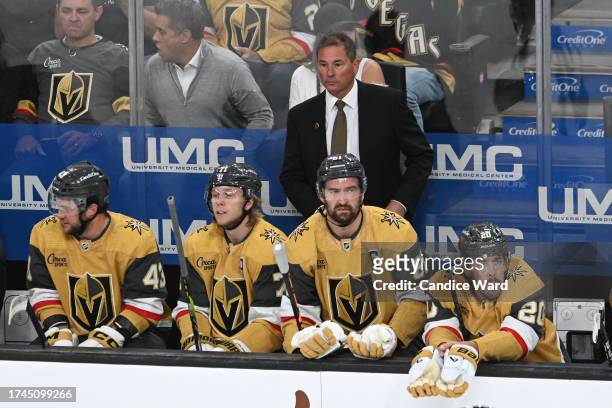 Head coach Bruce Cassidy of the Vegas Golden Knights looks down the ice against the Seattle Kraken in the first period at T-Mobile Arena on October...