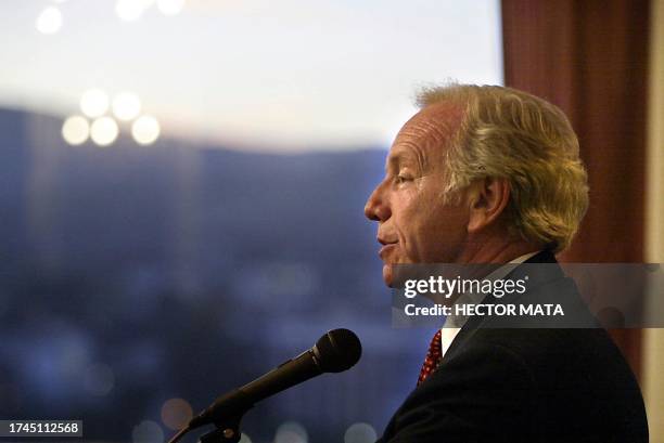 Senator Joe Lieberman gestures as he delivers a speech at the Regency Club during a meeting with young professionals in Los Angeles, 14 August 2003....