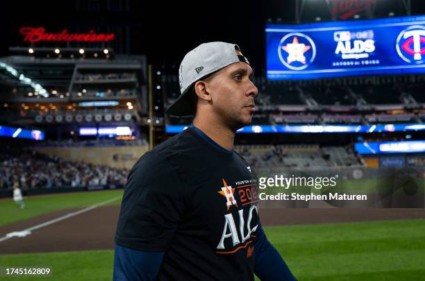 Michael Brantley of the Houston Astros celebrates after his team's victory in Game Four of the Division Series against the Minnesota Twins at Target...