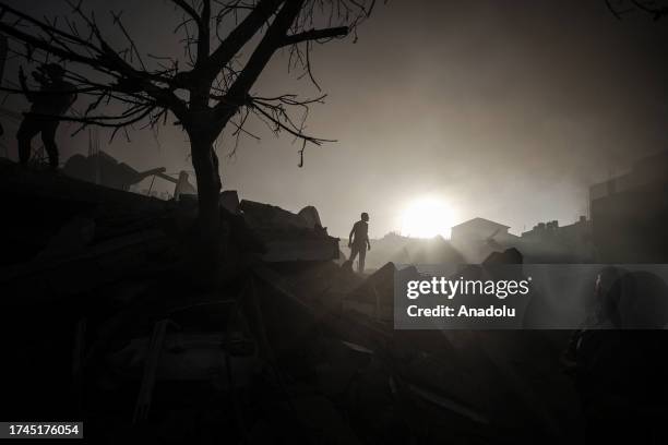 Buildings are destroyed after Israeli attacks as the Israeli airstrikes and artillery fires continue on the 19th day in Gaza City, Gaza on October...