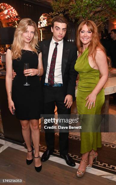 Lucy Brown, Sascha Bailey and Camilla Kerslake attend the VIP launch of Paper Moon London at Raffles London at The OWO on October 19, 2023 in London,...