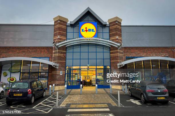 The Lidl logo is displayed inside a branch of the supermarket retailer Lidl on October 18, 2023 in Bristol, England. The German discount retailer...