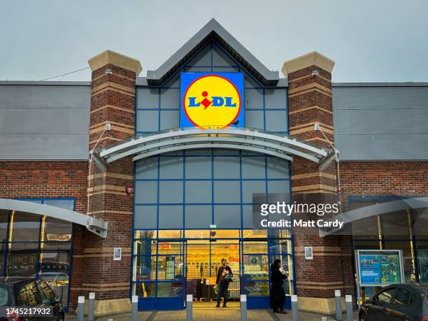 The Lidl logo is displayed inside a branch of the supermarket retailer Lidl on October 18, 2023 in Bristol, England. The German discount retailer...