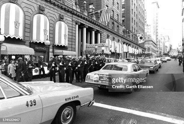 On Powell Street, police officers and Tactical Squad members await President Nixon's arrival at the St. Francis Hotel, San Francisco, California,...