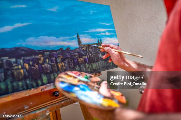 painter on canvas - oil paint stock pictures, royalty-free photos & images
