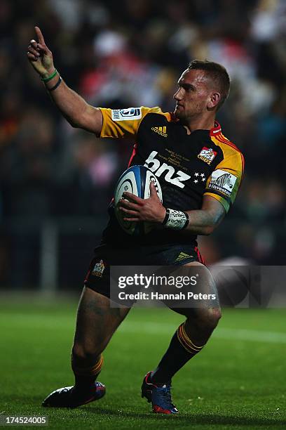 Aaron Cruden of the Chiefs celebrates after scoring a try during the Super Rugby semi final match between the Chiefs and the Crusaders at Waikato...