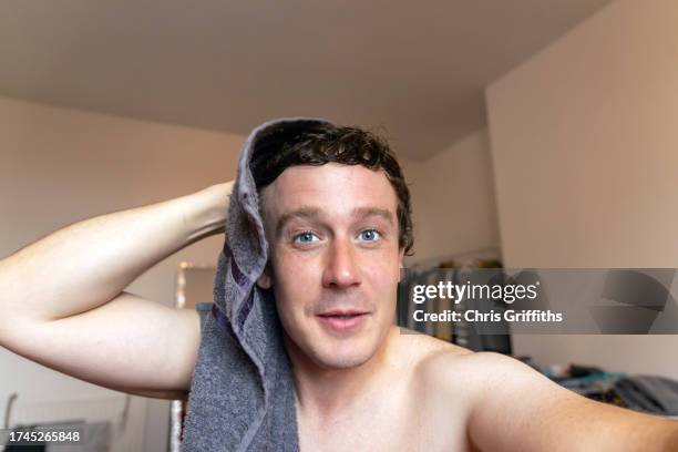 domestic life selfie, bristol, england, united kingdom - drying hair stock pictures, royalty-free photos & images