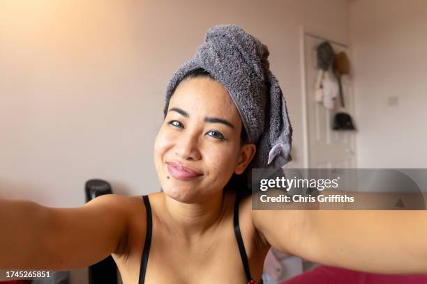 domestic life selfie, bristol, england, united kingdom - drying hair stock pictures, royalty-free photos & images