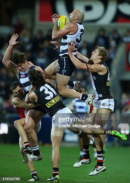 James Podsiadly of the Cats takes a high mark during the round 18 AFL match between the Geelong Cats and the St Kilda Saints at Simonds Stadium on...