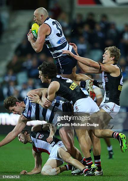 James Podsiadly of the Cats takes a high mark during the round 18 AFL match between the Geelong Cats and the St Kilda Saints at Simonds Stadium on...