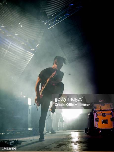 Nick Tsang of Modestep performs on stage on Day 1 of Global Gathering 2013 on July 26, 2013 in Stratford-upon-Avon, England.