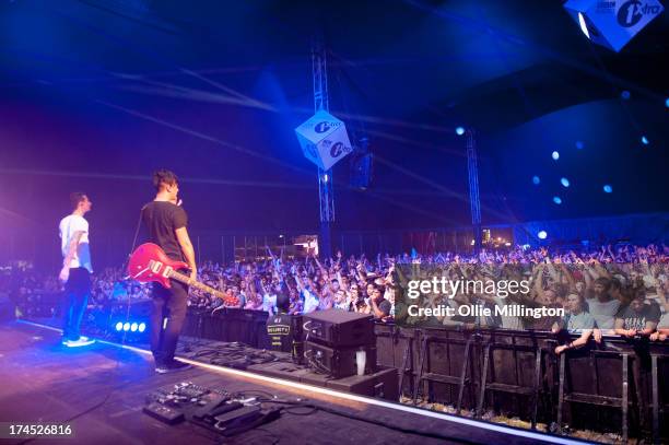 Josh Friend and Nick Tsang of Modestep perform on stage on Day 1 of Global Gathering 2013 on July 26, 2013 in Stratford-upon-Avon, England.