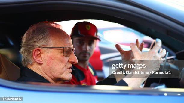 Michael Mann prepares for a Hot Lap with Charles Leclerc of Monaco and Ferrari during previews ahead of the F1 Grand Prix of United States at Circuit...