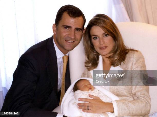 Spanish Prince Crown Felipe de Borbon , his wife Princess Letizia, and their newborn daughter, Princess Leonor, pose for a picture which was sent as...