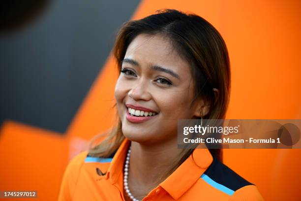 Bianca Bustamante of Philippines wears a McLaren shirt in the Paddock after signing to the McLaren Driver Development Programme during previews ahead...