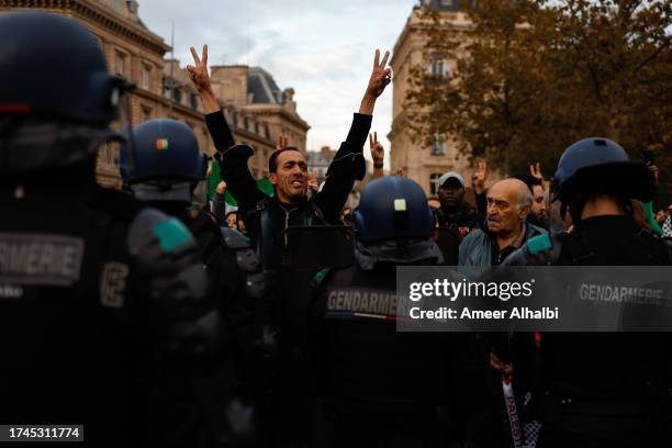 Protesters rally in support of Palestinians in the wake of the deadly explosion at a Gaza hospital, on October 19, 2023 in Paris, France. Nearly 500...