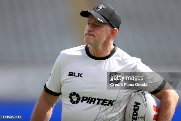 Kiwis coach Michael Maguire watches warm up during a New Zealand Kiwis league training session at The Trusts Arena on October 16, 2023 in Auckland,...