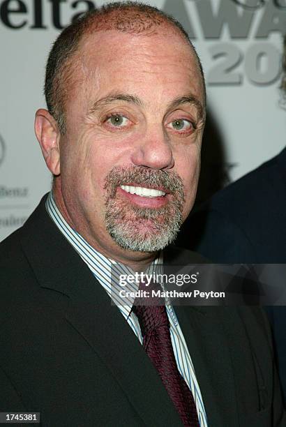 Singer/songwriter Billy Joel arrives at the 2002 New York Magazine Awards Luncheon at the Four Seasons Restaurant December 16 2002 in New York City....