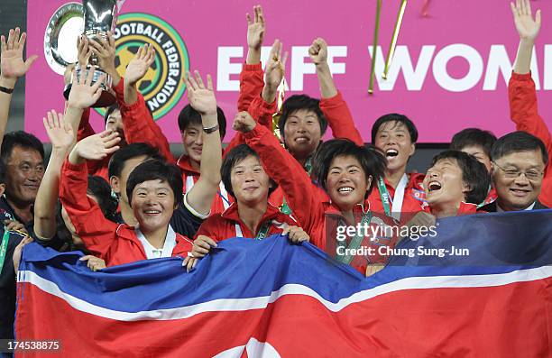 Korea DPR players celebrate after winning the EAFF Women's East Asian Cup 2013 at Jamsil Stadium on July 27, 2013 in Seoul, South Korea.