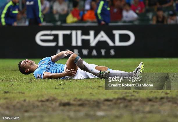 Matija Nastasic of Mancester City suffers an injury during the Barclays Asia Trophy Final match between Manchester City and Sunderland at Hong Kong...