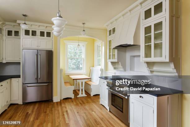 white kitchen with nook - nook architecture stockfoto's en -beelden