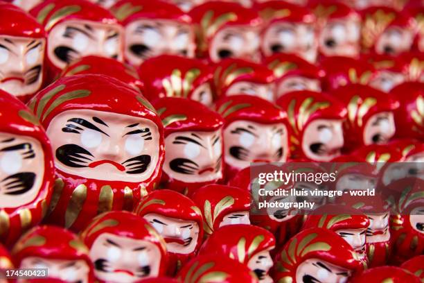 red daruma dolls - sensoji temple stock pictures, royalty-free photos & images