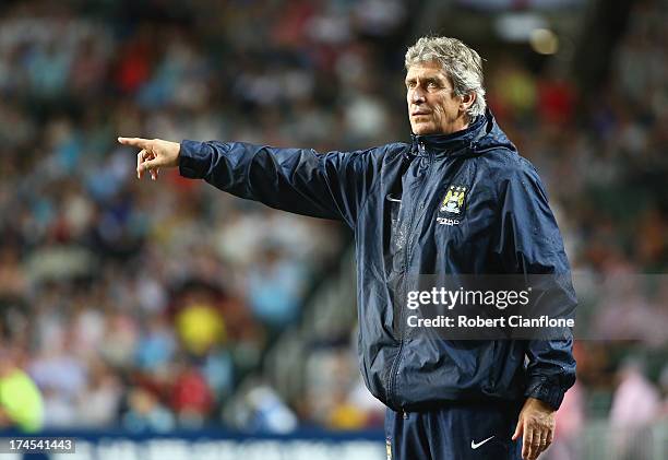 Manuel Pellegrini coach of Mancester City gestures during the Barclays Asia Trophy Final match between Manchester City and Sunderland at Hong Kong...