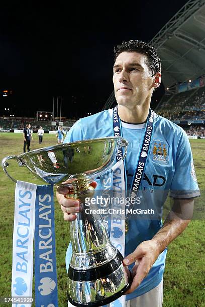 Gareth Barry of Manchester City celebrates after defeating Sunderland during the Barclays Asia Trophy Final match between Manchester City and...