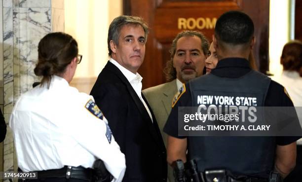 Donald Trump's former attorney Michael Cohen looks on at court during a break in the former presidents's fraud trial in New York on October 25, 2023....