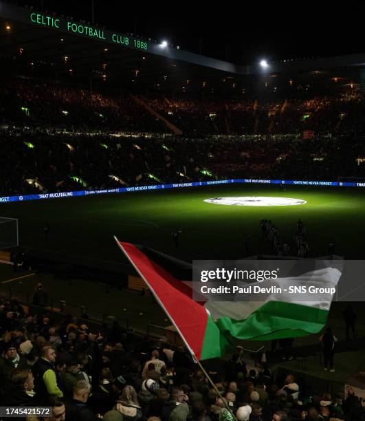 General view of Celtic Park as the fans hold up Palestine flags during a UEFA Champions League match between Celtic and Atletico de Madrid at Celtic...