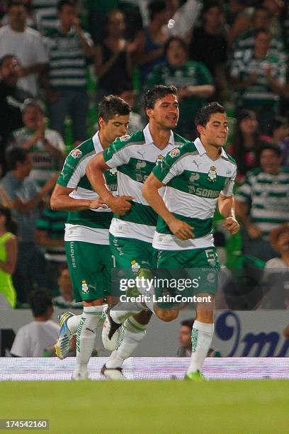 Oswaldo Alanis of Santos celebrates a goal against Cruz Azul during a match between Santos and Cruz Azul as part of the Apertura 2013 Liga MX at...