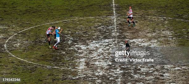 An elevated view of the pitch as John O' Shea of Sunderland AFC competes for the ball with Alvaro Negrado of Mancester City FC as referee Anthony...